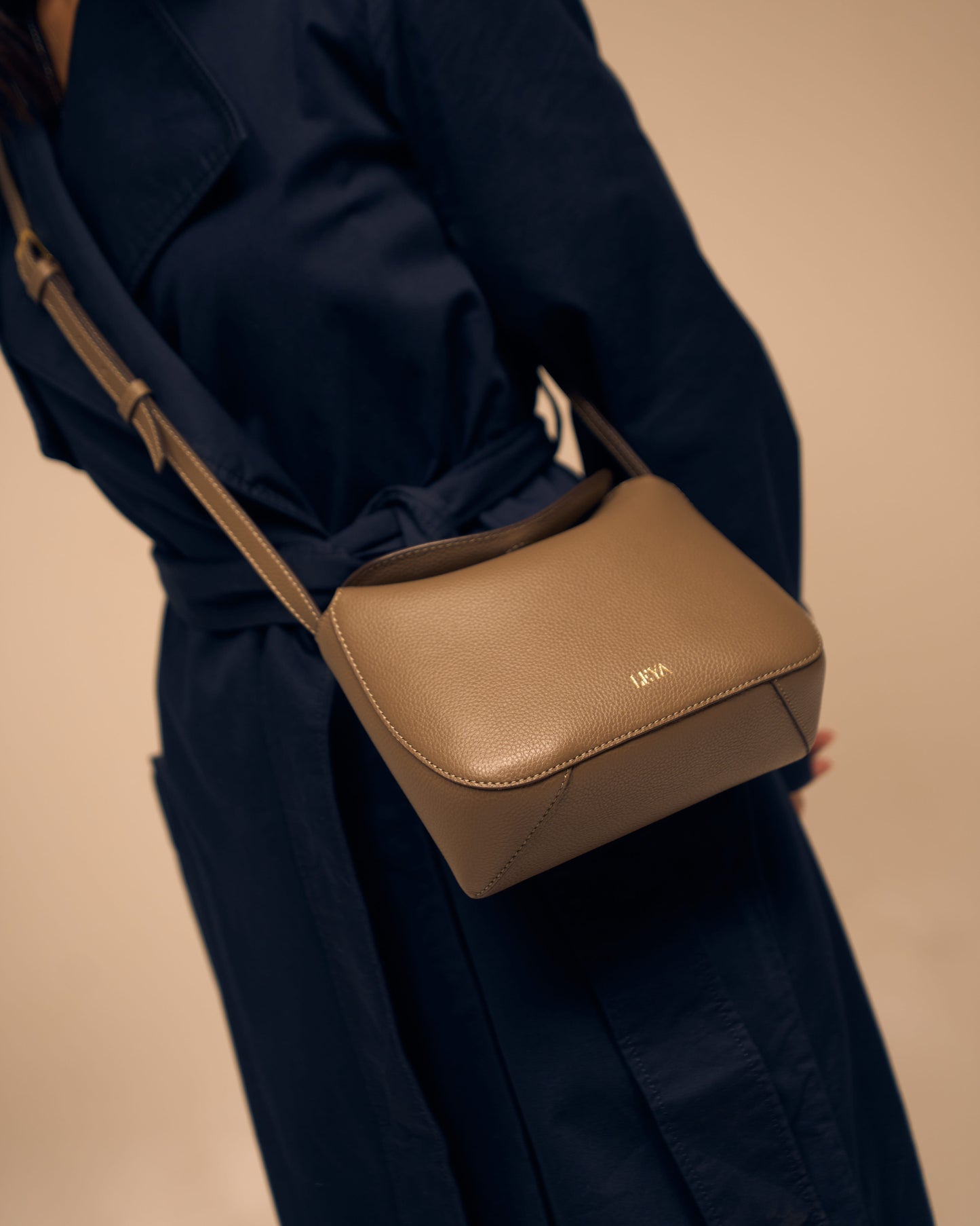 Model wearing Eclipse Crossbody Taupe